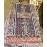 An Oriental rug, 204 x 123cm.