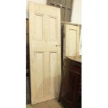 A stripped pine door, 207 x 72.5cm and a pair of smaller doors, each 171.5 x 43.5cm, (2).