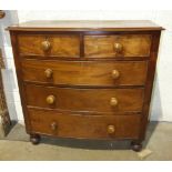 A late-19th century mahogany bow-fronted chest of two short and three long cockbeaded drawers, on
