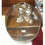 A plated oval pierced galleried tray, 61 x 40cm, a plated teapot and a sugar bowl.