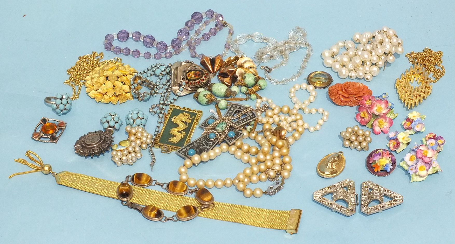 A pair of Trifari earrings, a Scottish silver and hardstone brooch and other items of jewellery.