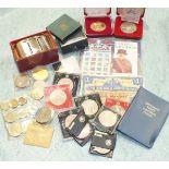 A Royal Mint 1997 United Kingdom Deluxe Proof Set in red leather case, a 1994 United Kingdom BU Coin