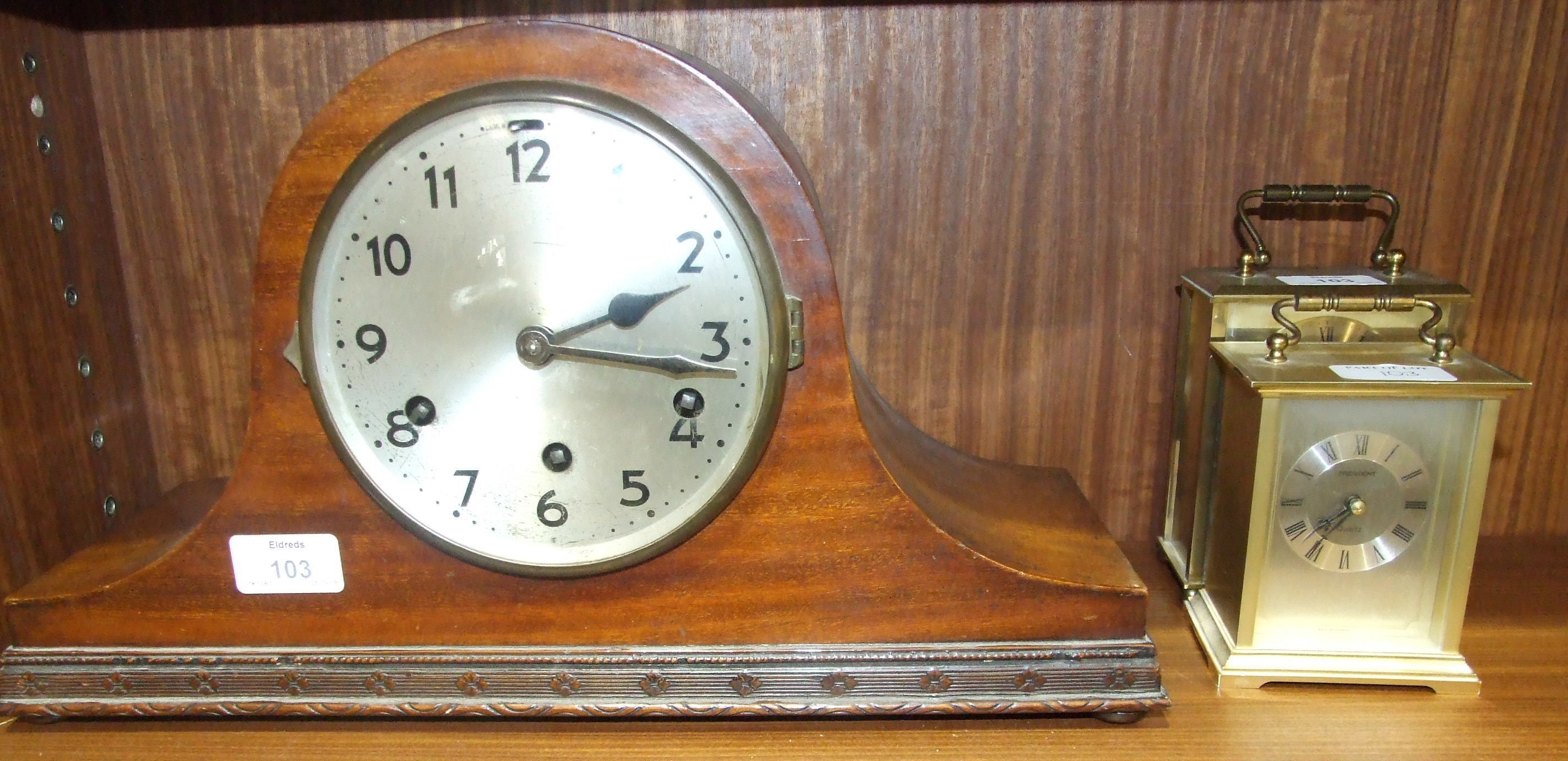 A mahogany-cased chiming mantel clock, 23cm high and two quartz mantel clocks, (3).