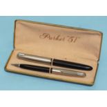 A 'Parker 51' black-bodied fountain pen with chromed cap, (clip a/f) and a matching propelling