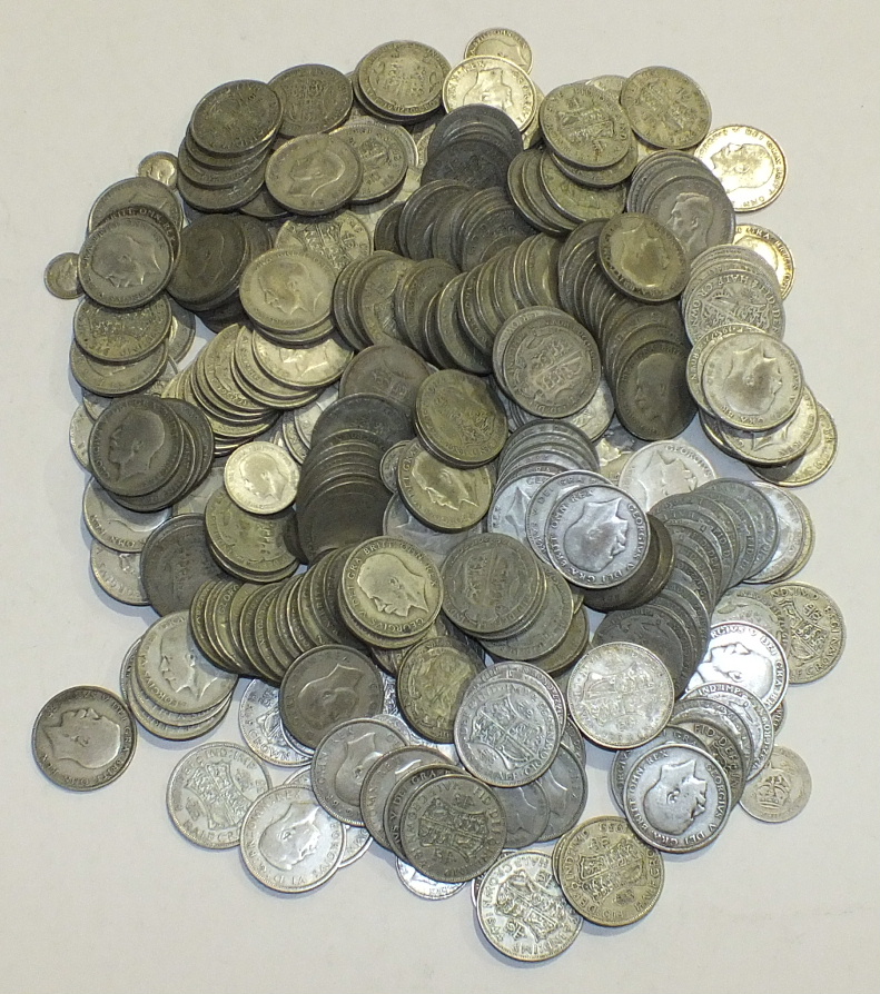 A quantity of British coinage, including a large collection of 1920-46 silver.