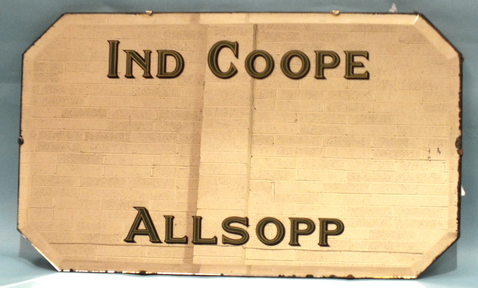 An Ind Coope Allsopp bevelled-edge mirror c1930's, with green and gold lettering, 40.5 x 68.5cm, two