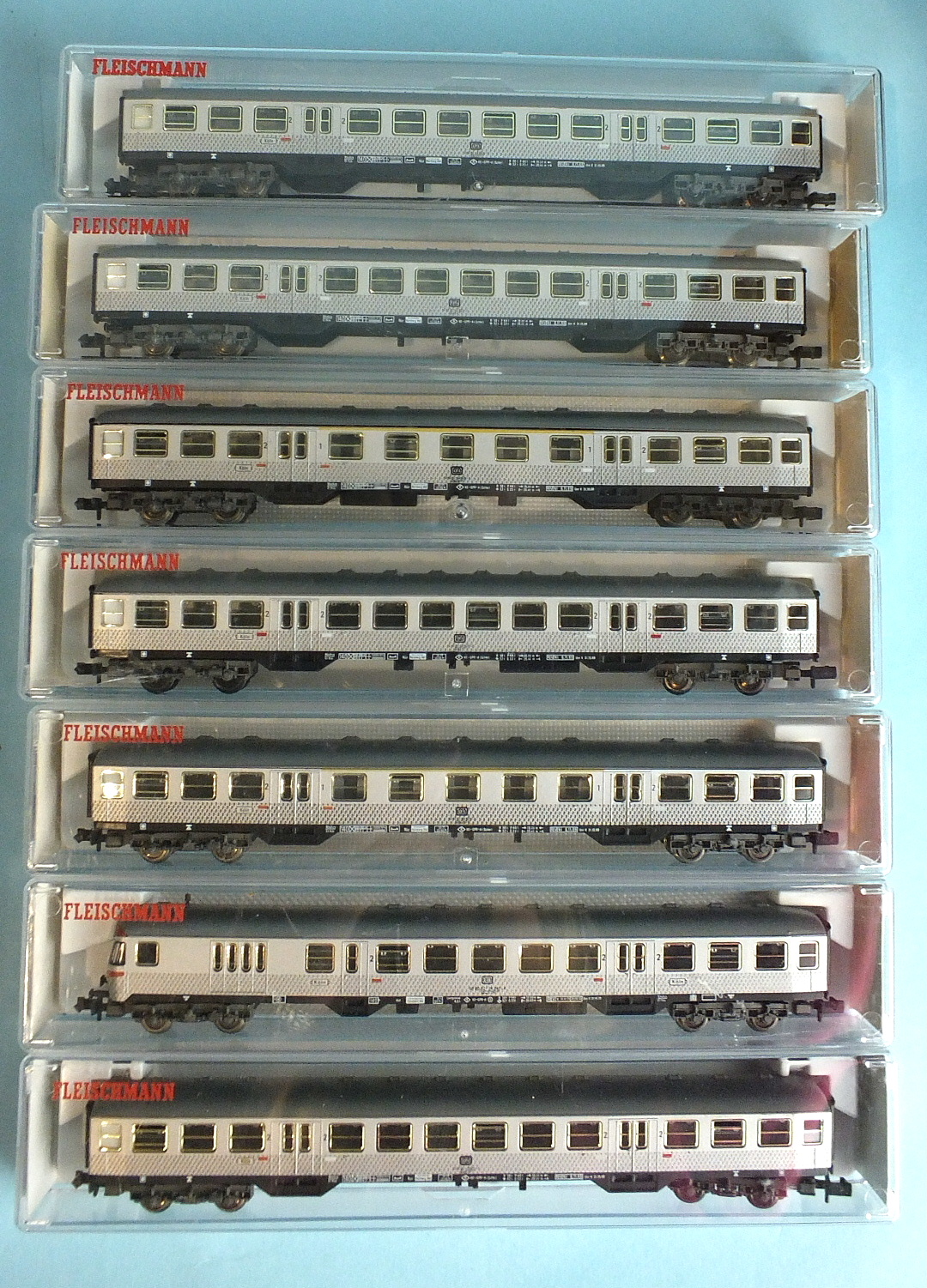 Fleischmann, N gauge, seven DB silver livery coaches, no.s 8120, 8121 (x2), 8122 (x4), all boxed, (