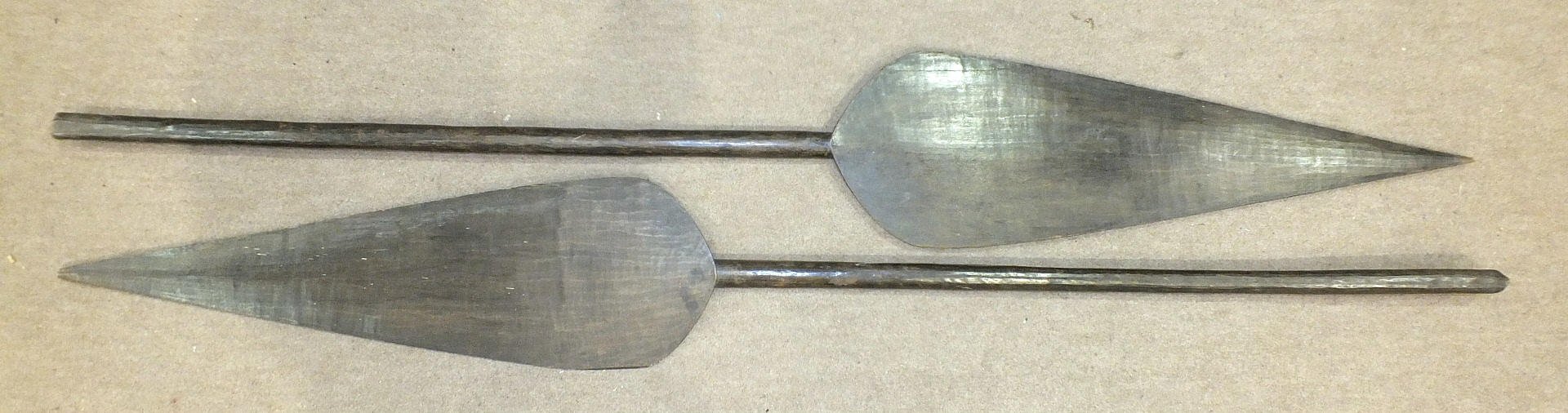 A pair of Bemba tribal paddles of typical spear-head shape, 170cm long, (2).