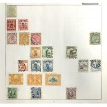 A selection of Chinese stamps on album pages, including 1897 red revenue, 1c on 3c mint.