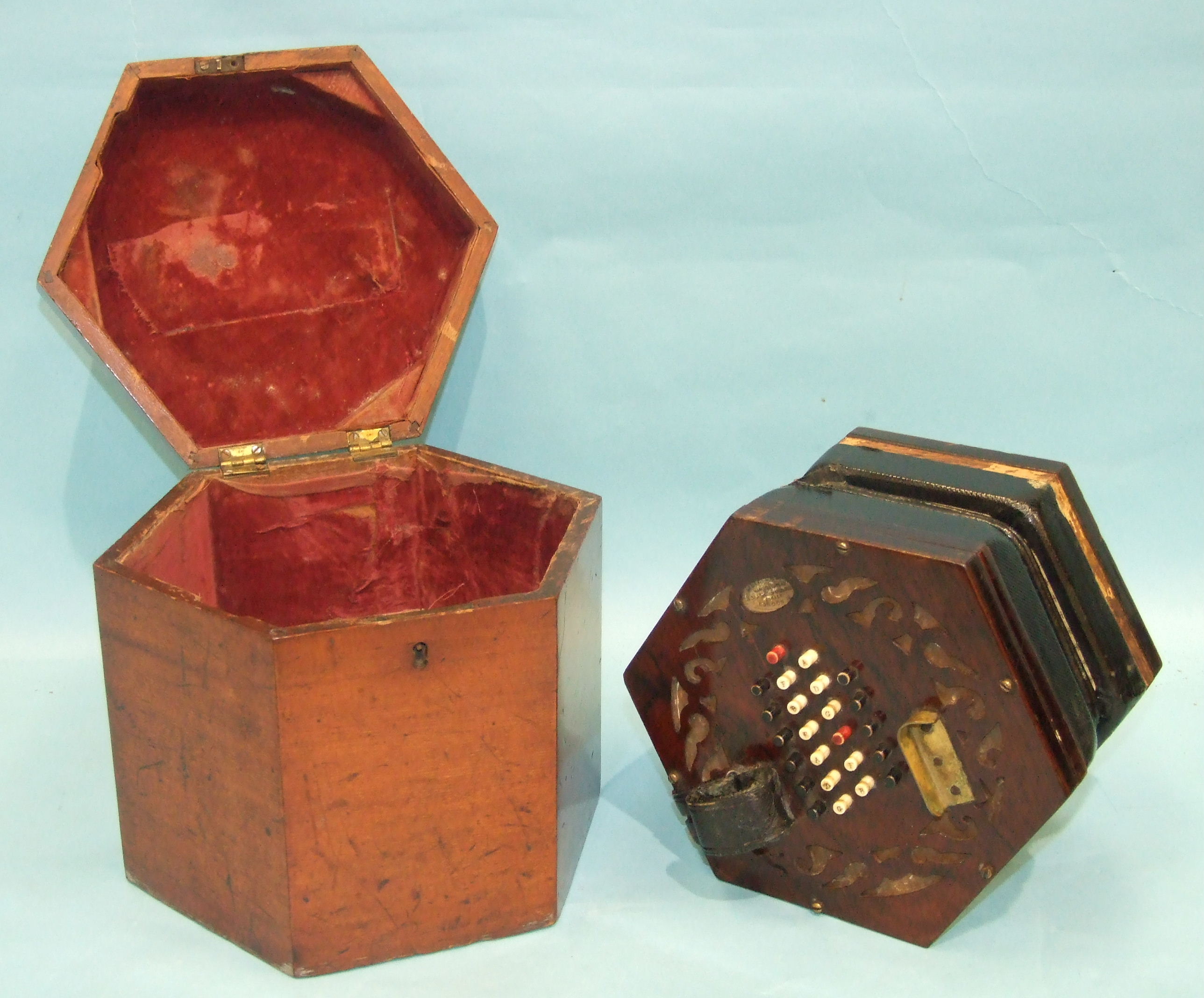 A Metzler & Co. 48-key five-fold concertina numbered 21938, with pierced ends, boxed.