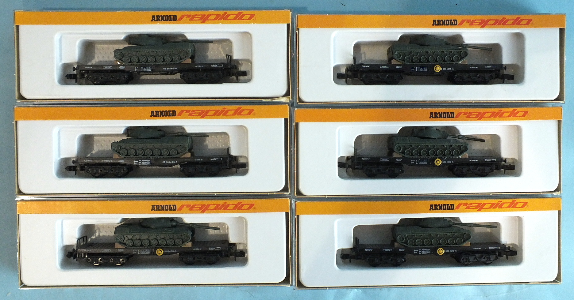 Arnold Rapido, N gauge, six boxed 0497 heavy duty trucks with Leopard tanks, (6).