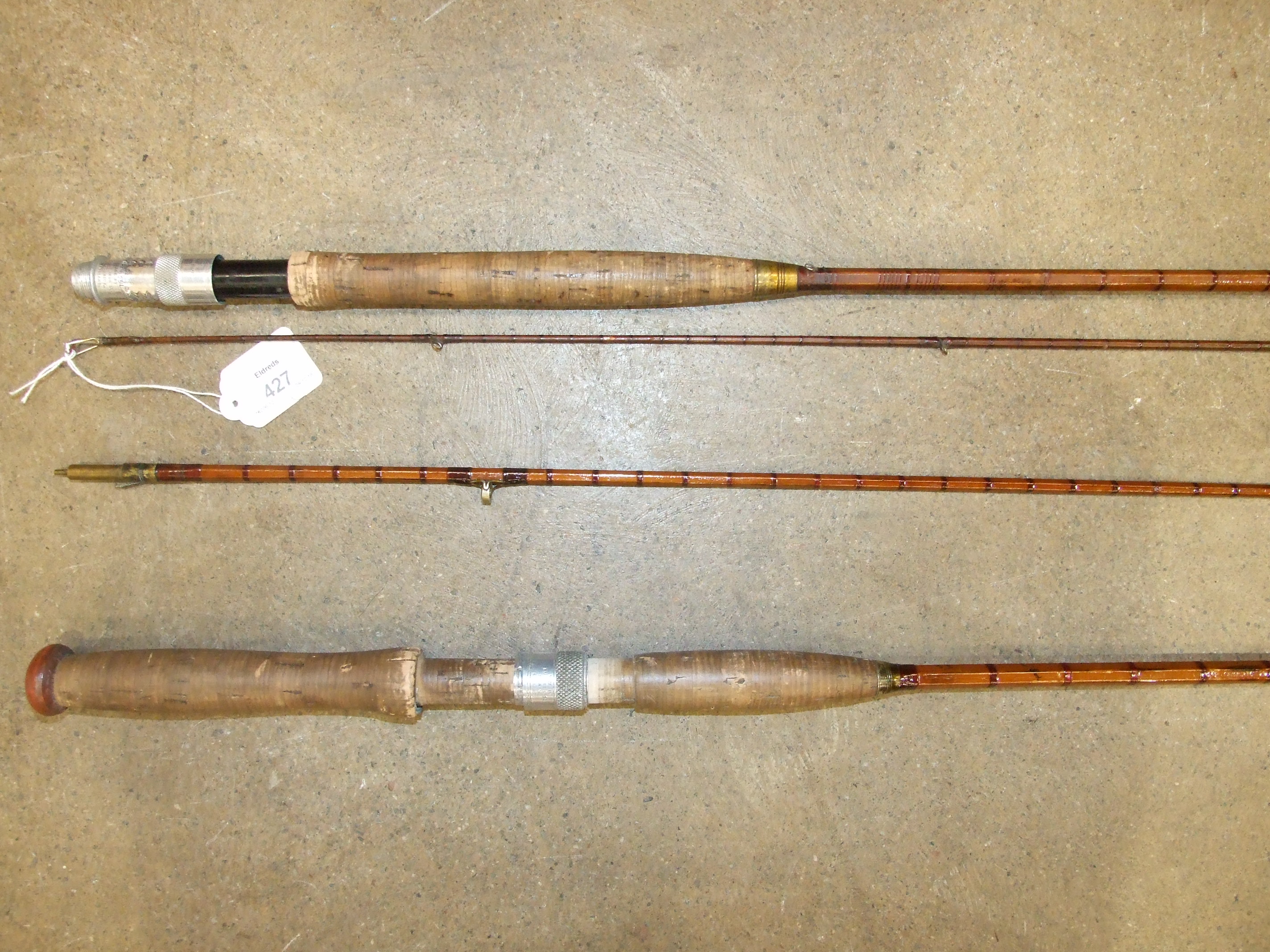 A Hardy's 8' 6" two-piece split-cane fly rod "The No.1 Victor Rod" and a Hardy's 9' two-piece