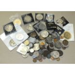 A collection of British and foreign coinage, including a 1928 USA one-dollar, a George III 1811 3-