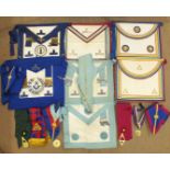 A collection of Craft Masonic regalia including PGM's undress apron, Mark, Ark Mariners and