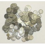 A collection of British and foreign coinage, including pre-1946 silver, etc.