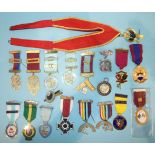 A collection of metal Masonic jewels including Craft, Mark, Chapter and other orders, a silver ARP