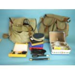 Two canvas trout bags, a small collection of fishing flies, hooks and miscellaneous items.