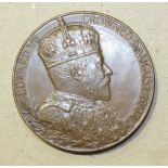 An Edward VII bronze Coronation Medallion 1902, the obverse with bust of Queen Alexandra, 5.6cm