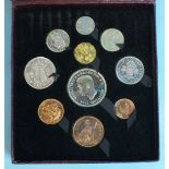 A Royal Mint George VI 1951 Festival of Britain ten-coin set in red presentation box and a 1951
