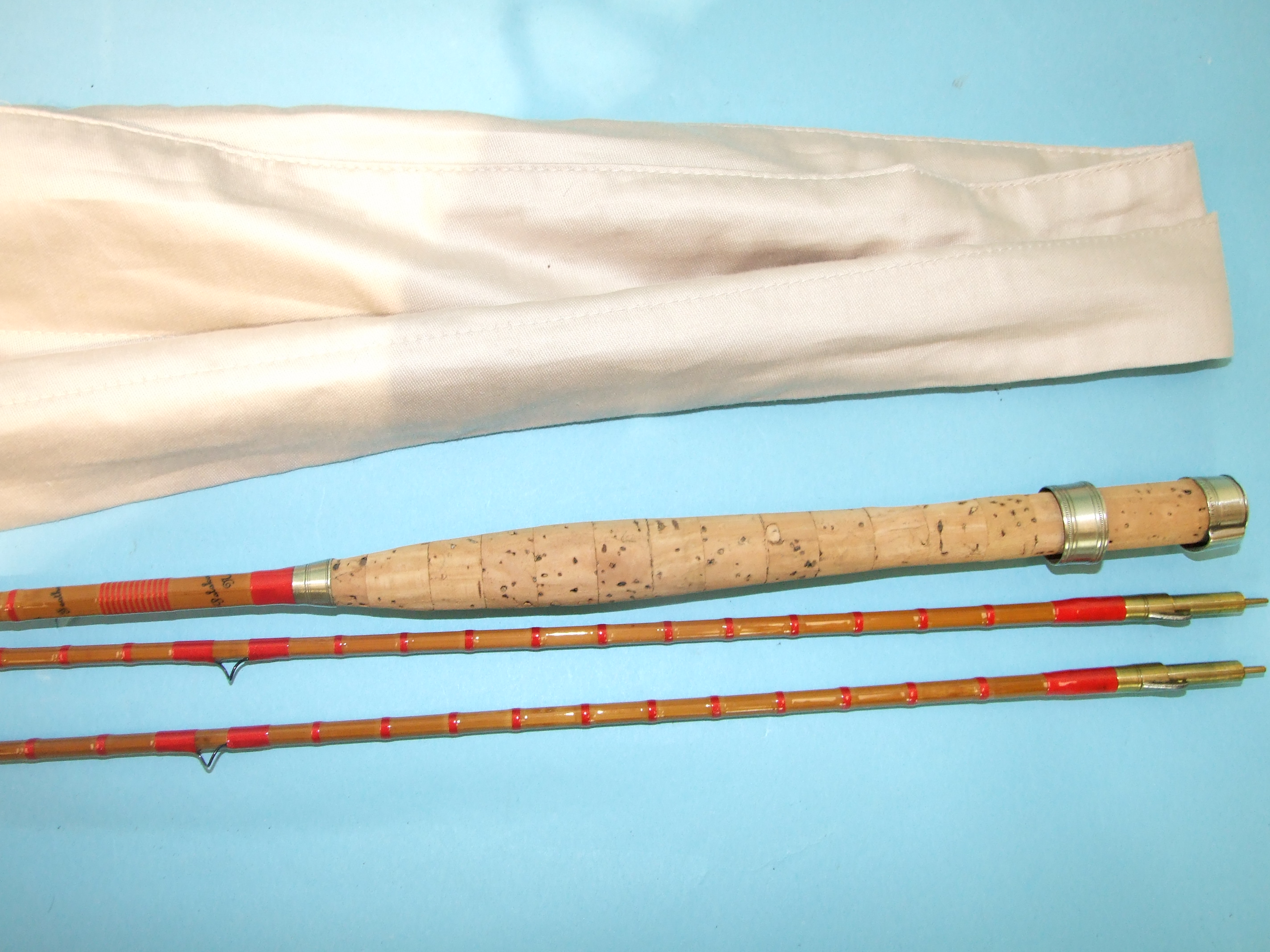 A Hardy's split-cane two-piece fly rod "The Featherweight Regal" no.246936, 7' 6", with spare tip,