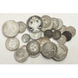 A collection of foreign coinage, includes silver.