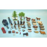 A collection of Britains, J Hill & Co. and other lead figures, farm animals, road and railway