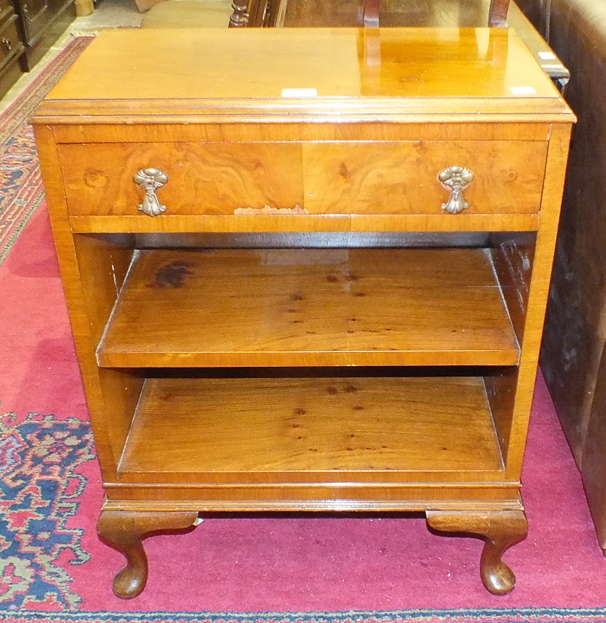 A modern walnut low bookcase, 61cm wide, an oak tea trolley, a Lloyd Loom linen basket and a