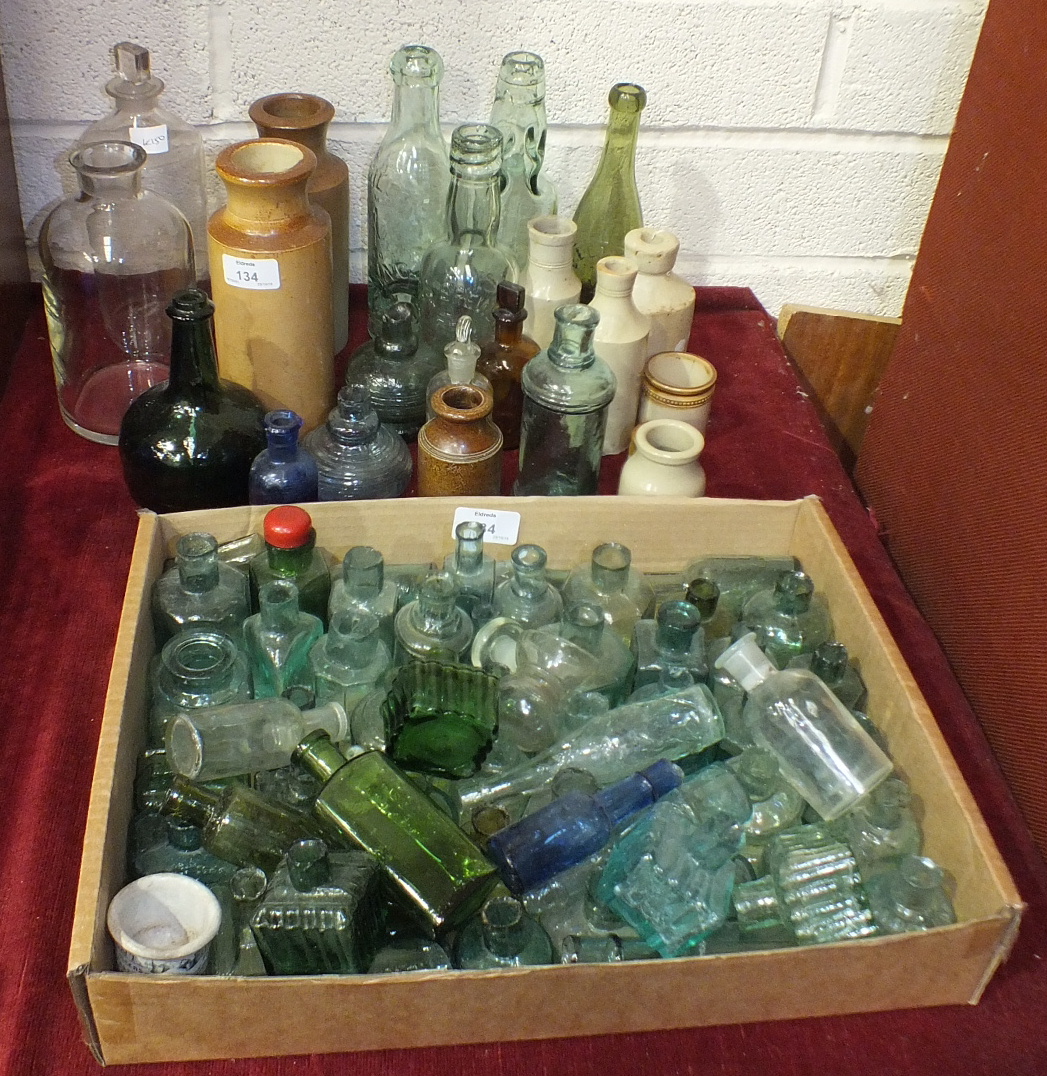 A collection of mineral and other glass bottles, etc.