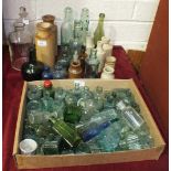 A collection of mineral and other glass bottles, etc.