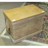 A stripped pine chest fitted with iron carrying handles, 60 x 37.5cm, 45cm high.