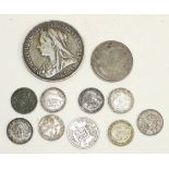 A Queen Victoria 1895 crown and various British and foreign coins and bank notes.