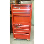 A Snap-On painted metal tool chest in two parts, 69cm wide, 145cm high, on associated castors.