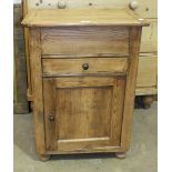 A pine bedside cupboard, 55cm wide and a modern pine coffee table, 92cm x 57cm, (2).