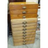 A stripped pine collectors' chest of eight drawers, 39cm wide, 54cm high, 29cm deep and a smaller