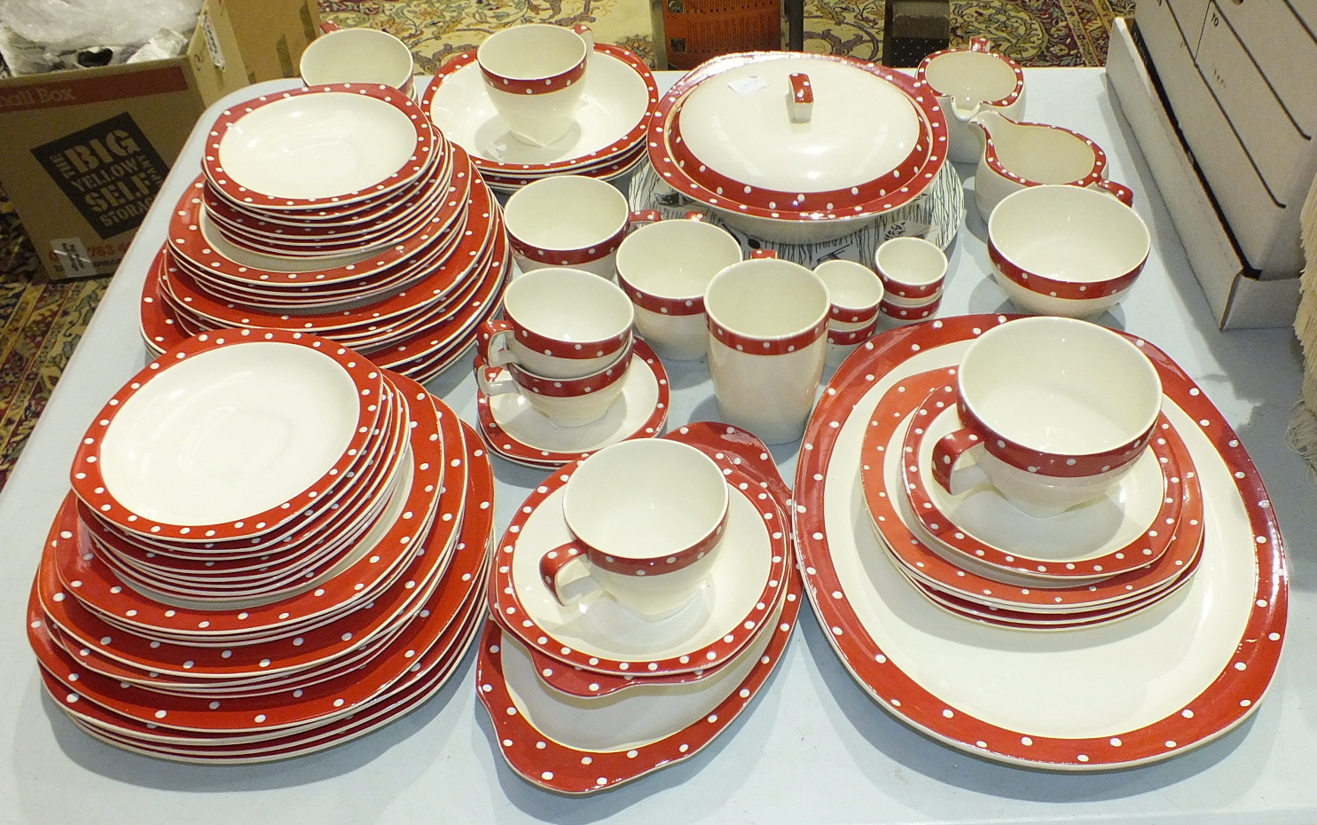 Seventy-three pieces of 1950's Midwinter Stylecraft shape tea and dinnerware in the "Red Domino"