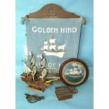 An oak-glazed certificate case, 65 x 40cm, a small carved wood model of the Golden Hind, a Golden