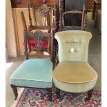 An early-20th century child's upholstered button-back-and-seat chair on turned front legs, a pair of