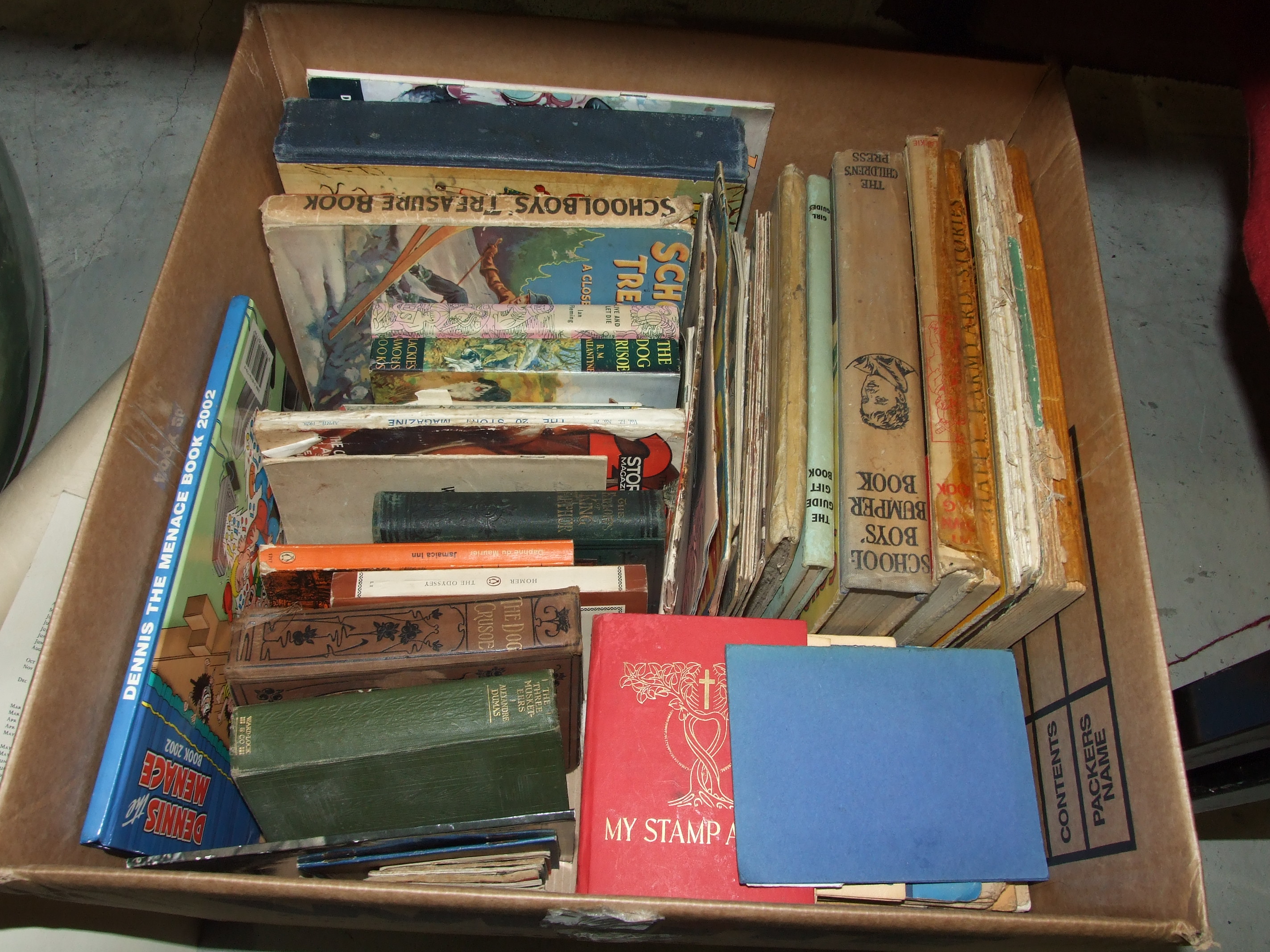 A collection of children's books and annuals.