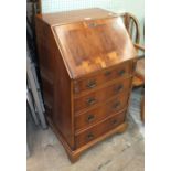 A modern yew wood bureau, the fall front above four drawers, 50.5cm wide, a pair of elm and beech