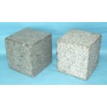 A large pair of cube-shaped granite ashlars, 15cm, (2).