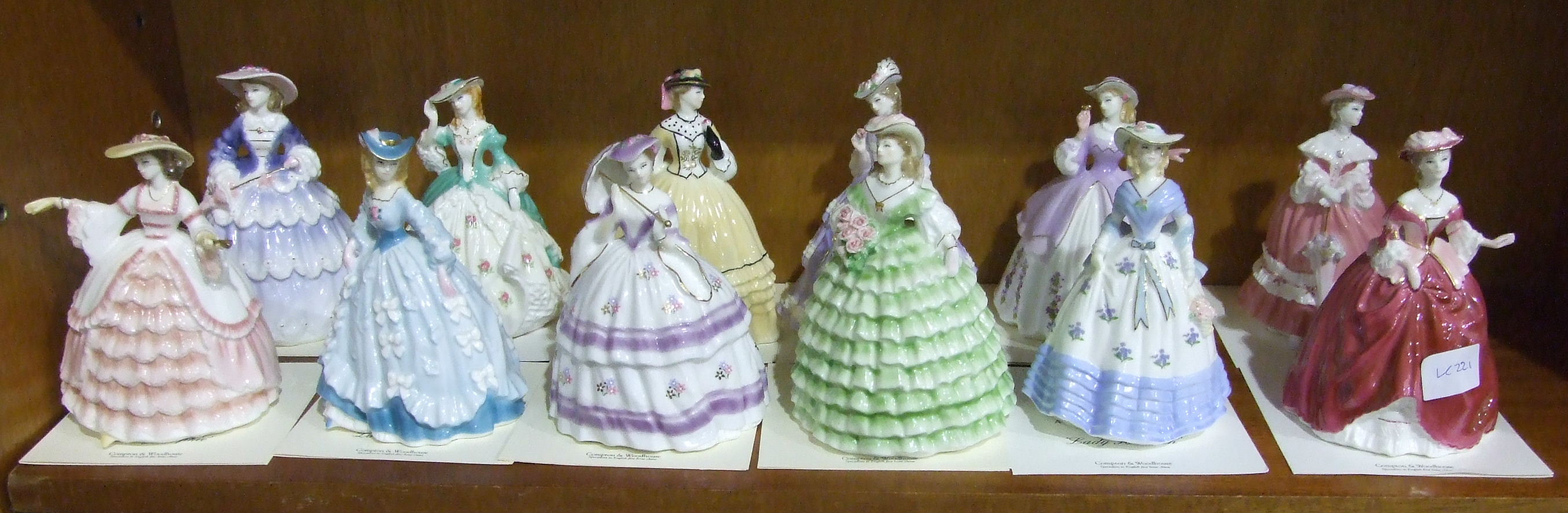 A collection of twelve Royal Worcester 'The Fashionable Victorians' figurines, all with