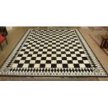 A large Masonic black and white carpet, the tessellated pavement within a diamond border