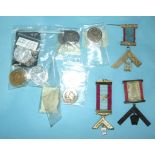 A collection of Mark Masonic tokens, an old Past Master's jewel, a new Past Master's jewel and a