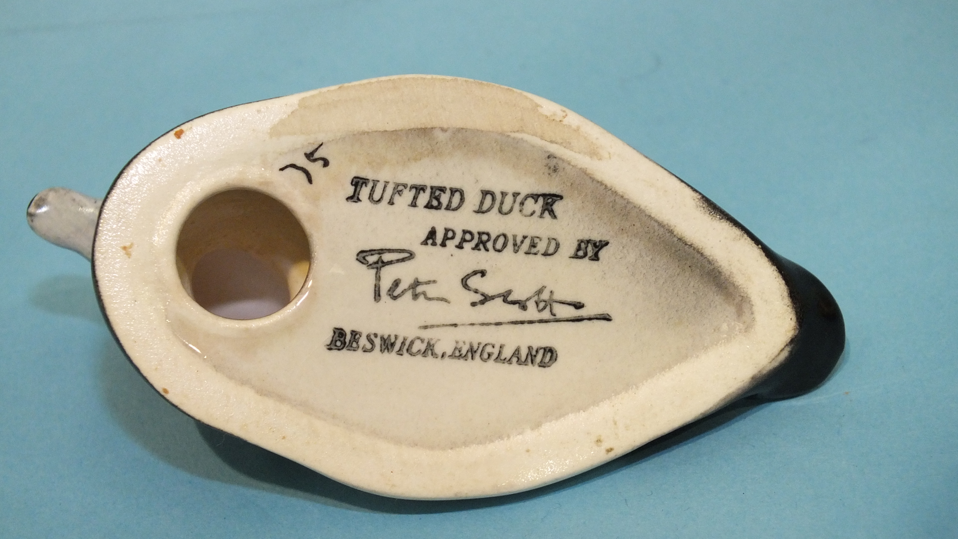 A Beswick 'Tufted Duck', printed mark and 'Approved by Peter Scott' beneath, 8cm. - Image 2 of 2