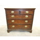 An early-18th century oak chest of two short and three long cockbeaded drawers, 102cm wide, 96cm