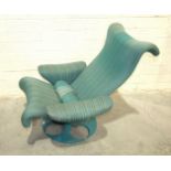 A 1960's/70's upholstered swivel lounge chair in green and blue striped upholstery, on cut-away