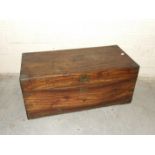 A small camphor wood chest with corner and intermediate metal bindings, 80cm x 38cm x 36cm high.