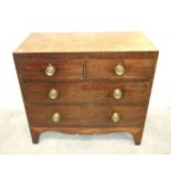 A Georgian mahogany rectangular chest of two short and two long drawers, on bracket feet, 92cm wide,