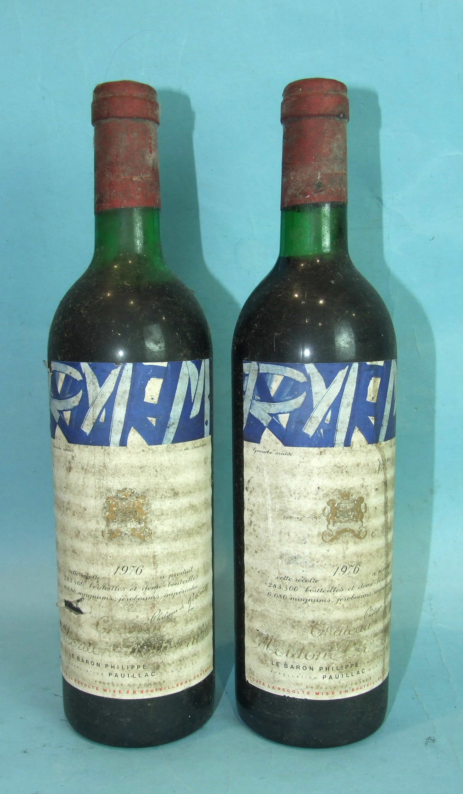 Chateau Mouton Rothschild 1976, 1er Grand Cru Classé, two bottles, labels soiled, high shoulder