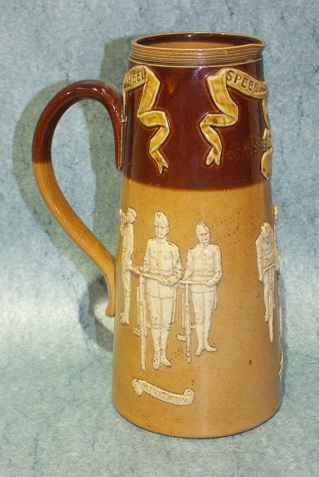 A Doulton Lambeth stoneware tapered jug with applied figures of cyclists, 'Military, Path and Road', - Image 4 of 6
